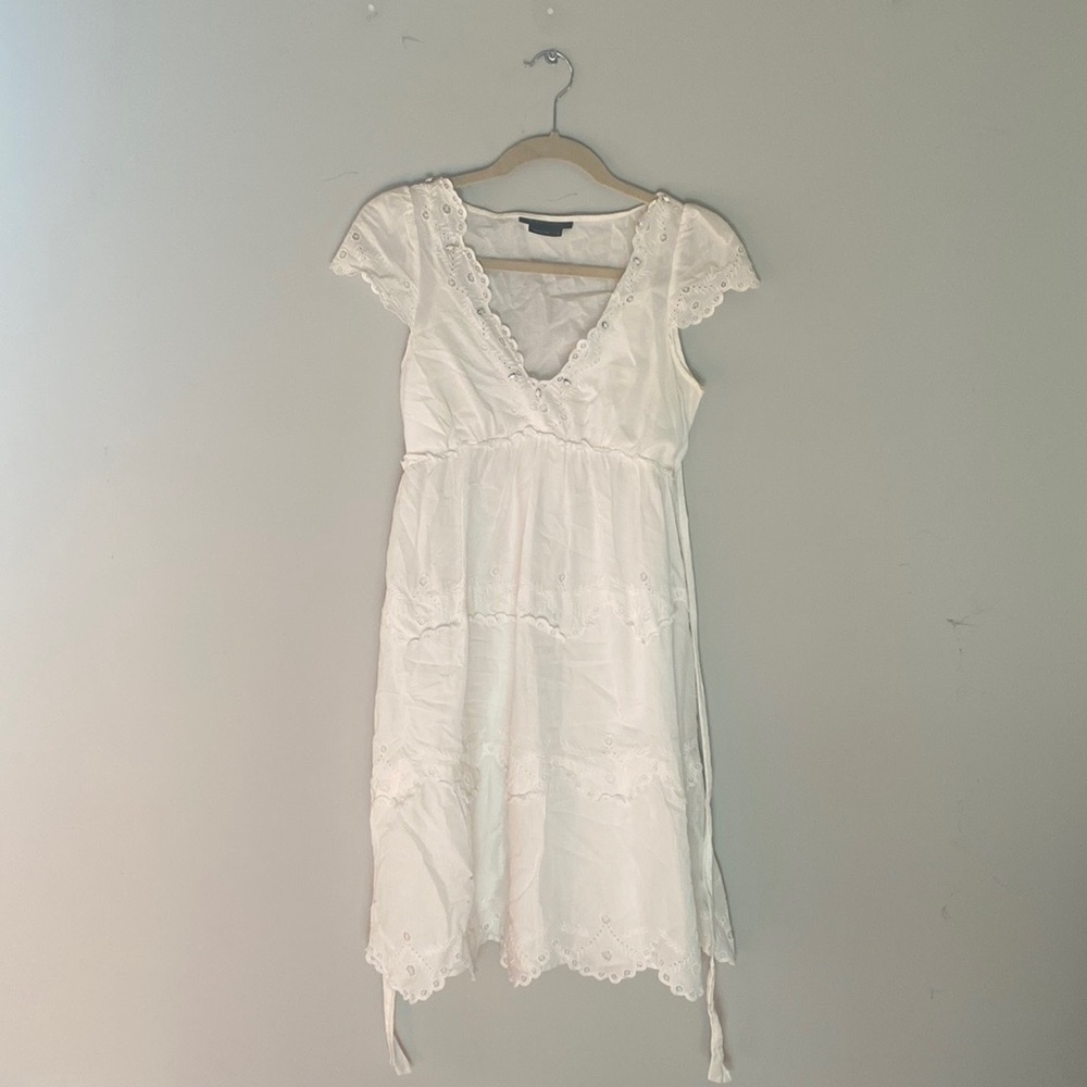 Size 2 BCBG MAXAZRIA white cap sleeve dress with eyelet lace details.